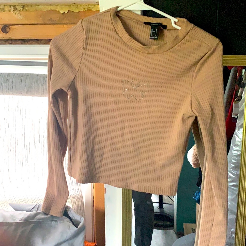 A long sleeve brown shirt